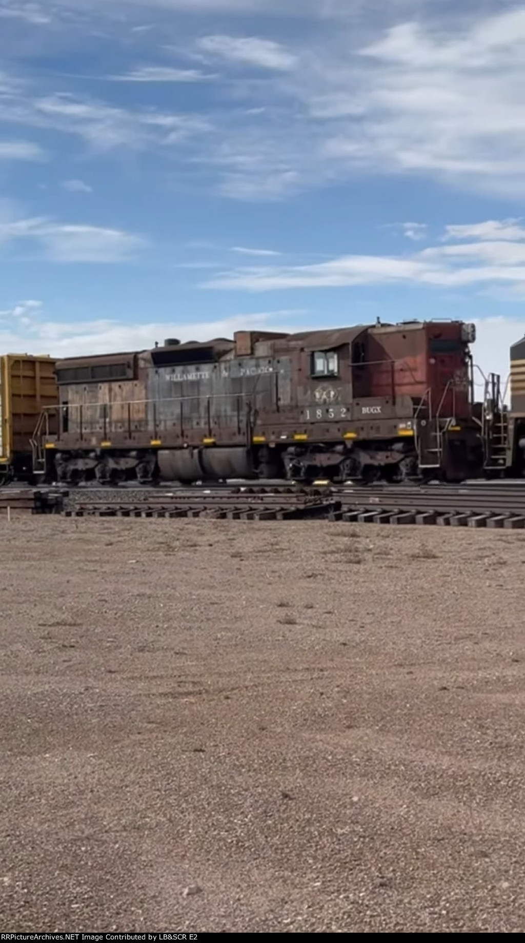 BUGX SD9E 1852 on BNSF train H-PASKCK at East Helena, MT.